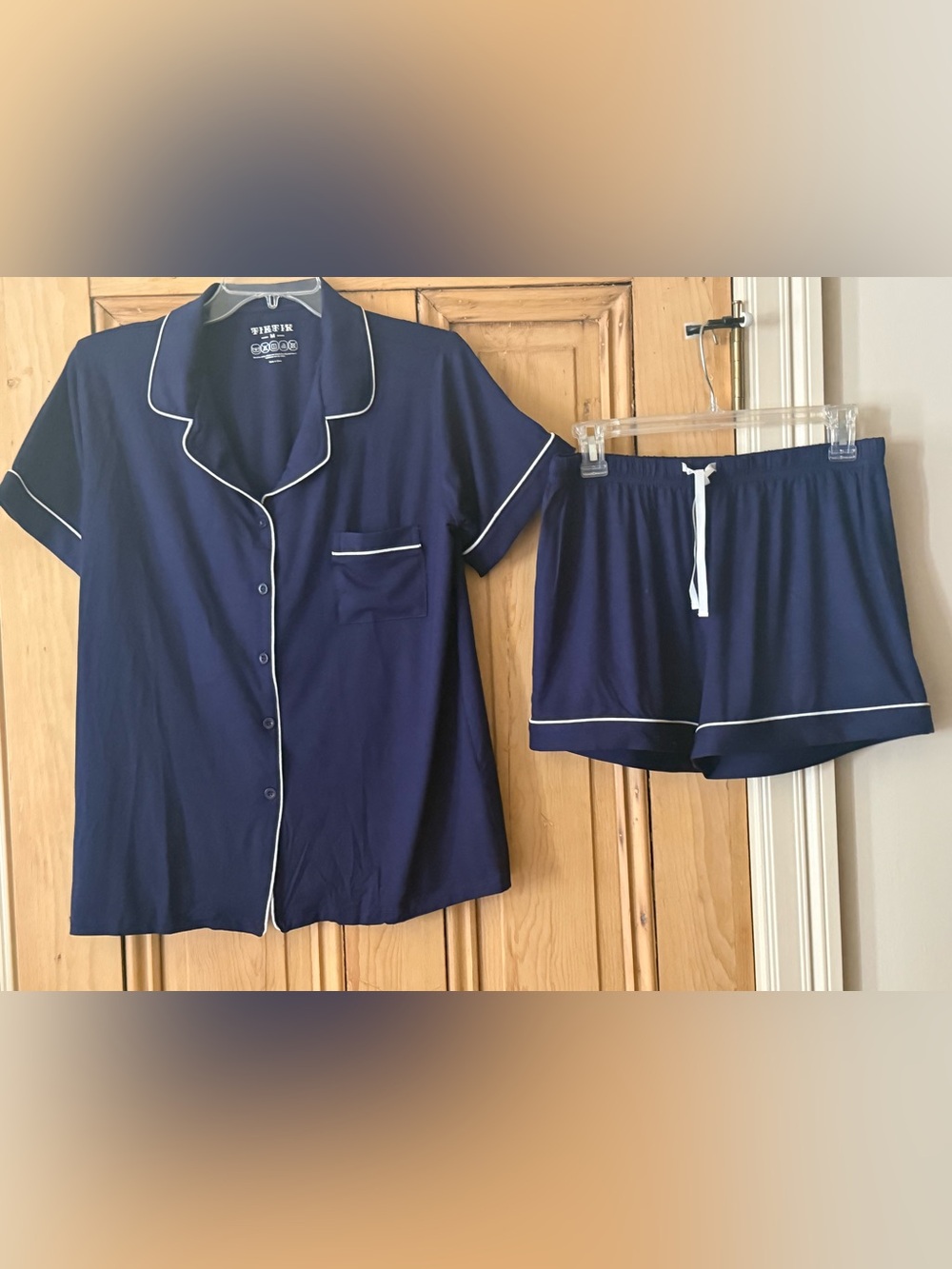 Navy blue pajamas, set with white trim